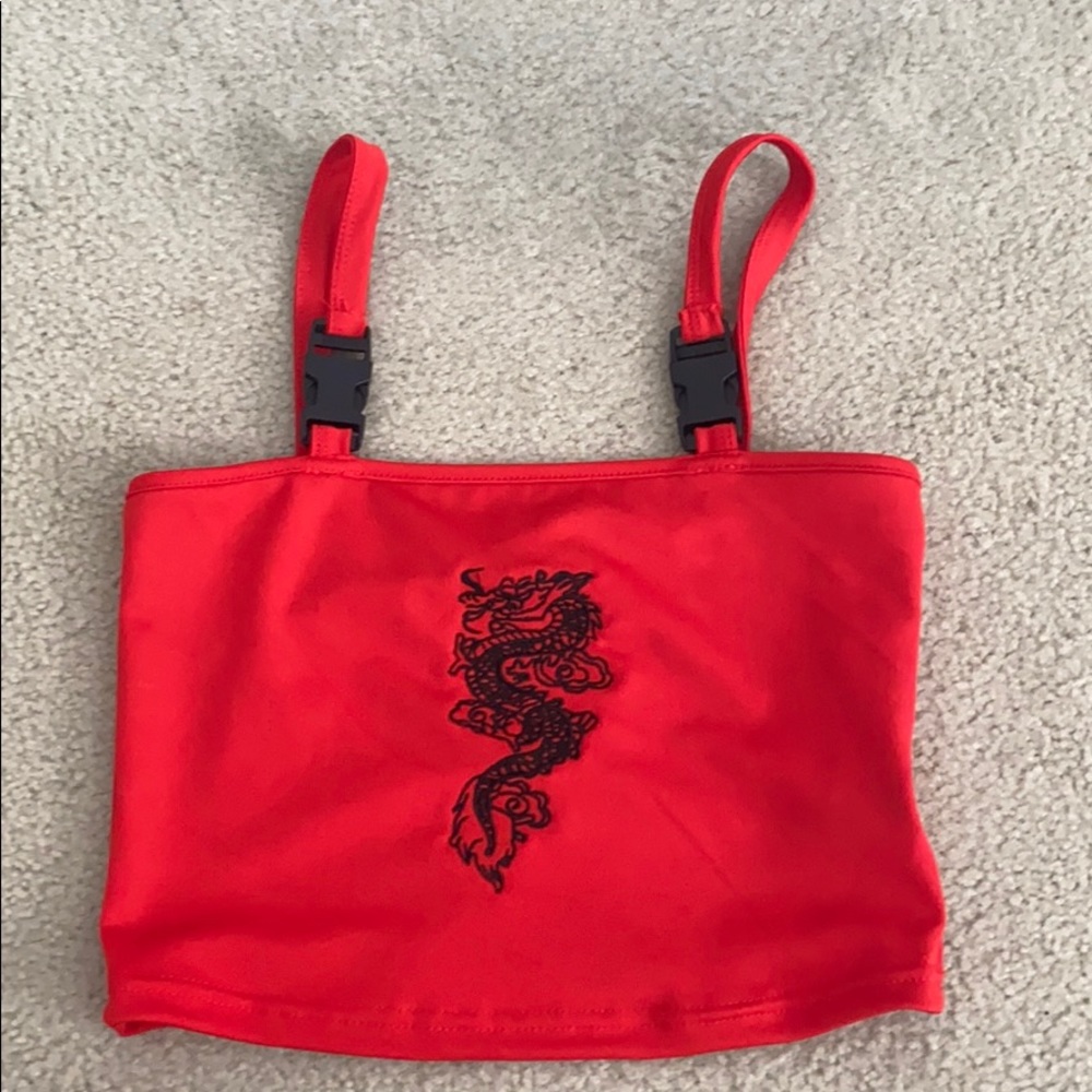 Red crop top with black dragon in middle